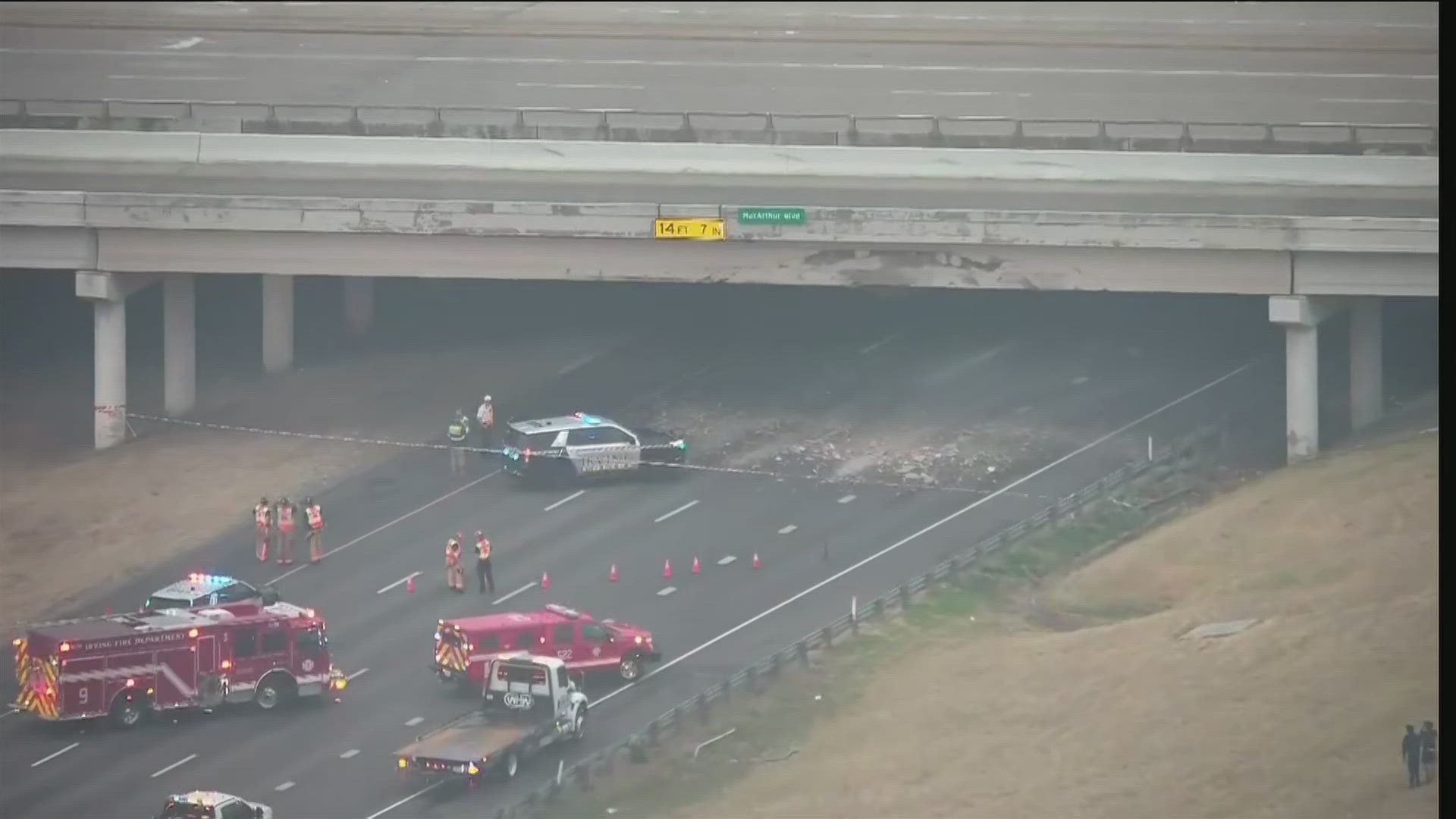 All westbound lanes of Interstate 635 appear to be shut down following an incident that caused major damage to the MacArthur Blvd overpass in Irving.