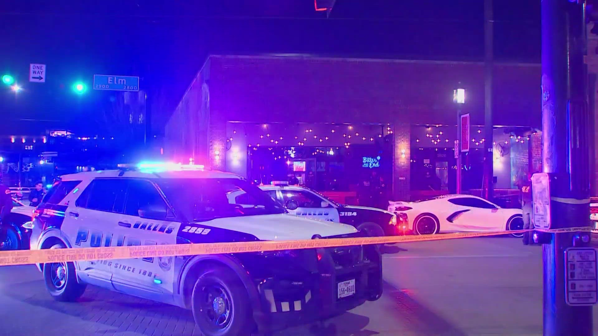 Dallas police said a man and woman were shot around at the Bitter End bar in the Deep Ellum area.