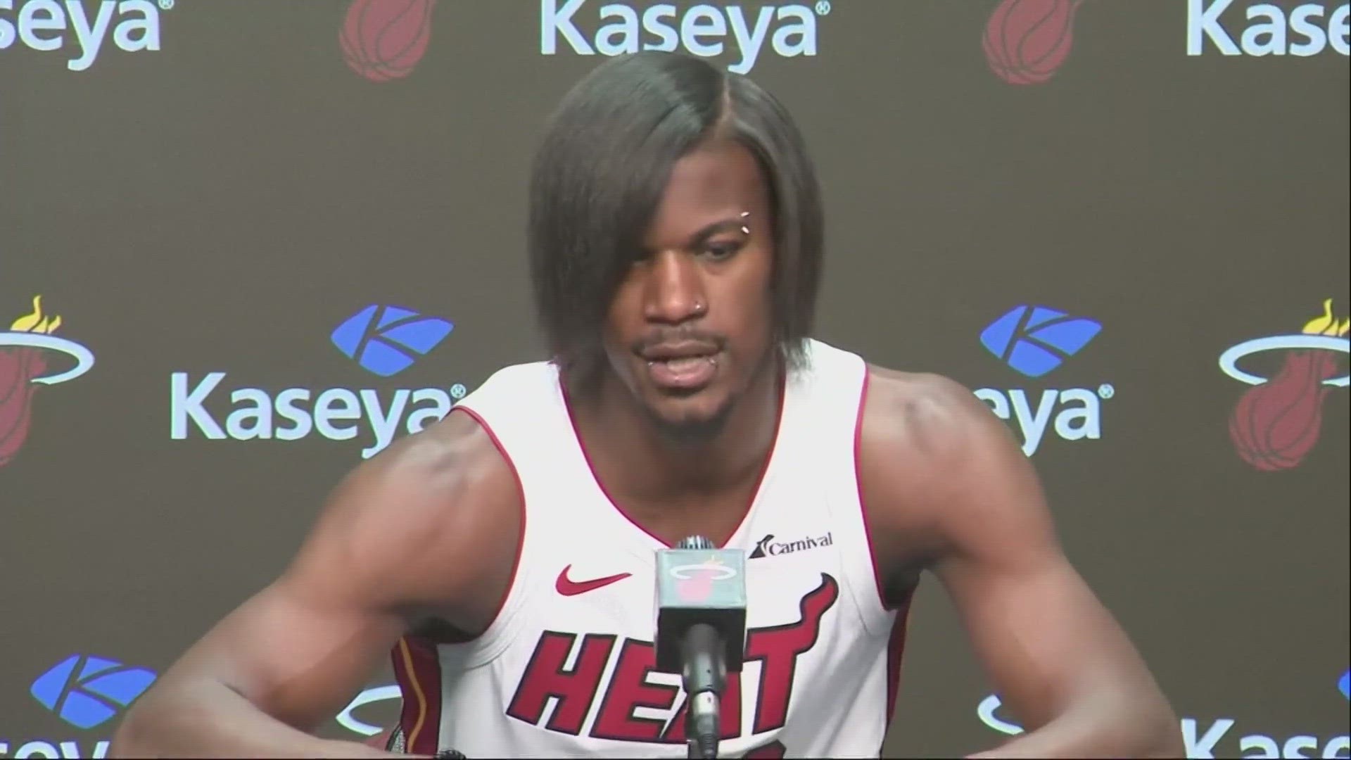 Emo Jimmy Butler brings new look to Miami Heat's Media Day | wfaa.com