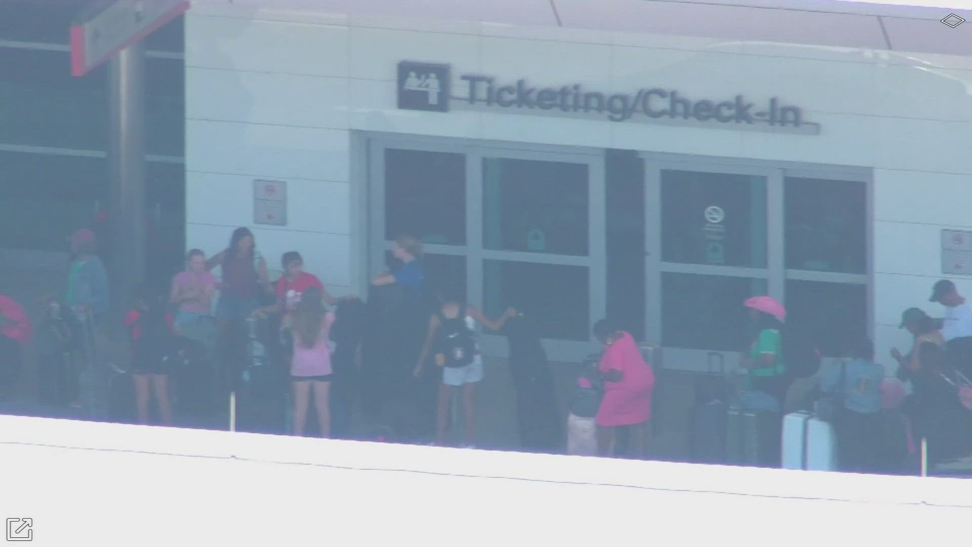 An influx of travelers and a problem with a baggage belt led to long lines at Dallas Love Field.