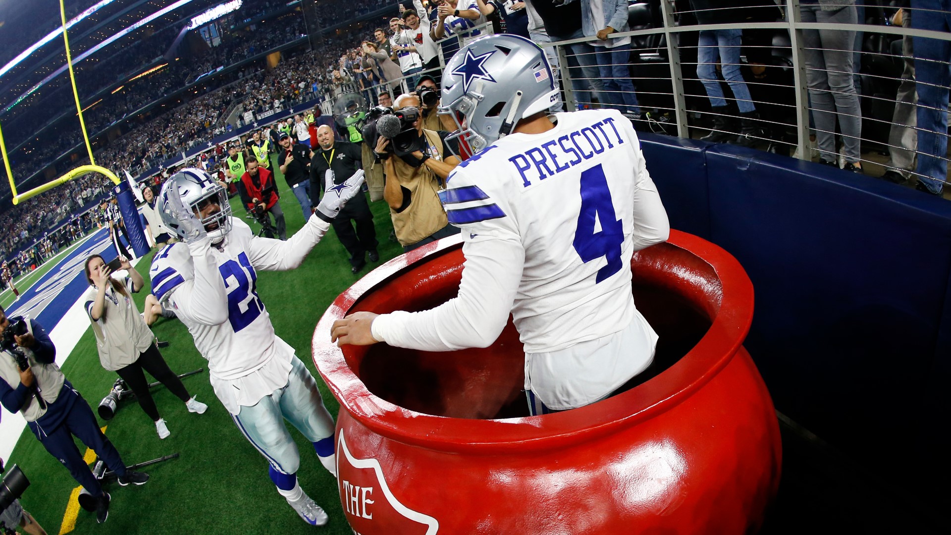 Cowboys receive joy in serving early Thanksgiving at Salvation Army