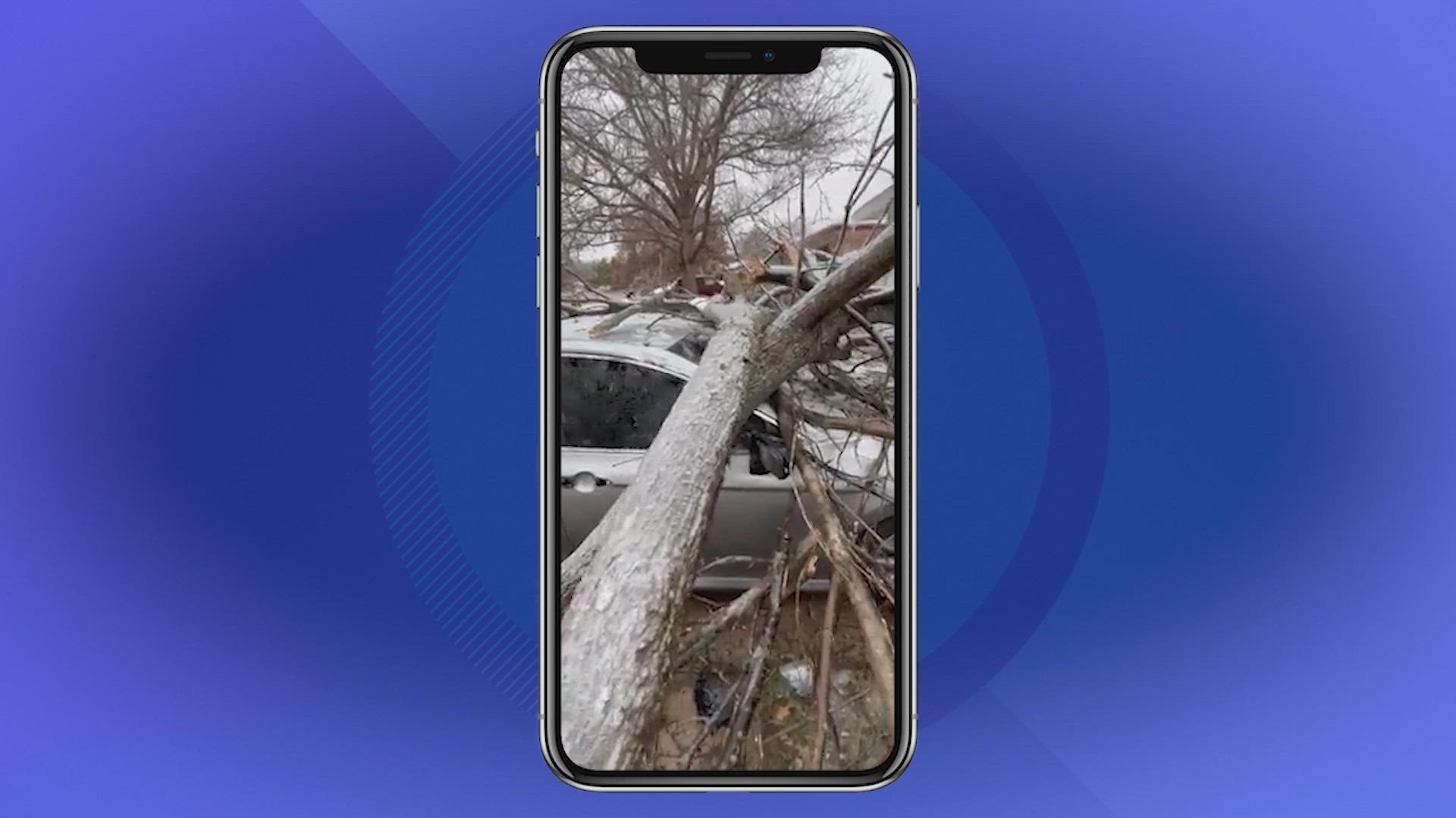 As the winter storm continues to impact many parts of North Texas, ice on a tree caused the entire thing to fall over on top of a car in Hurst.