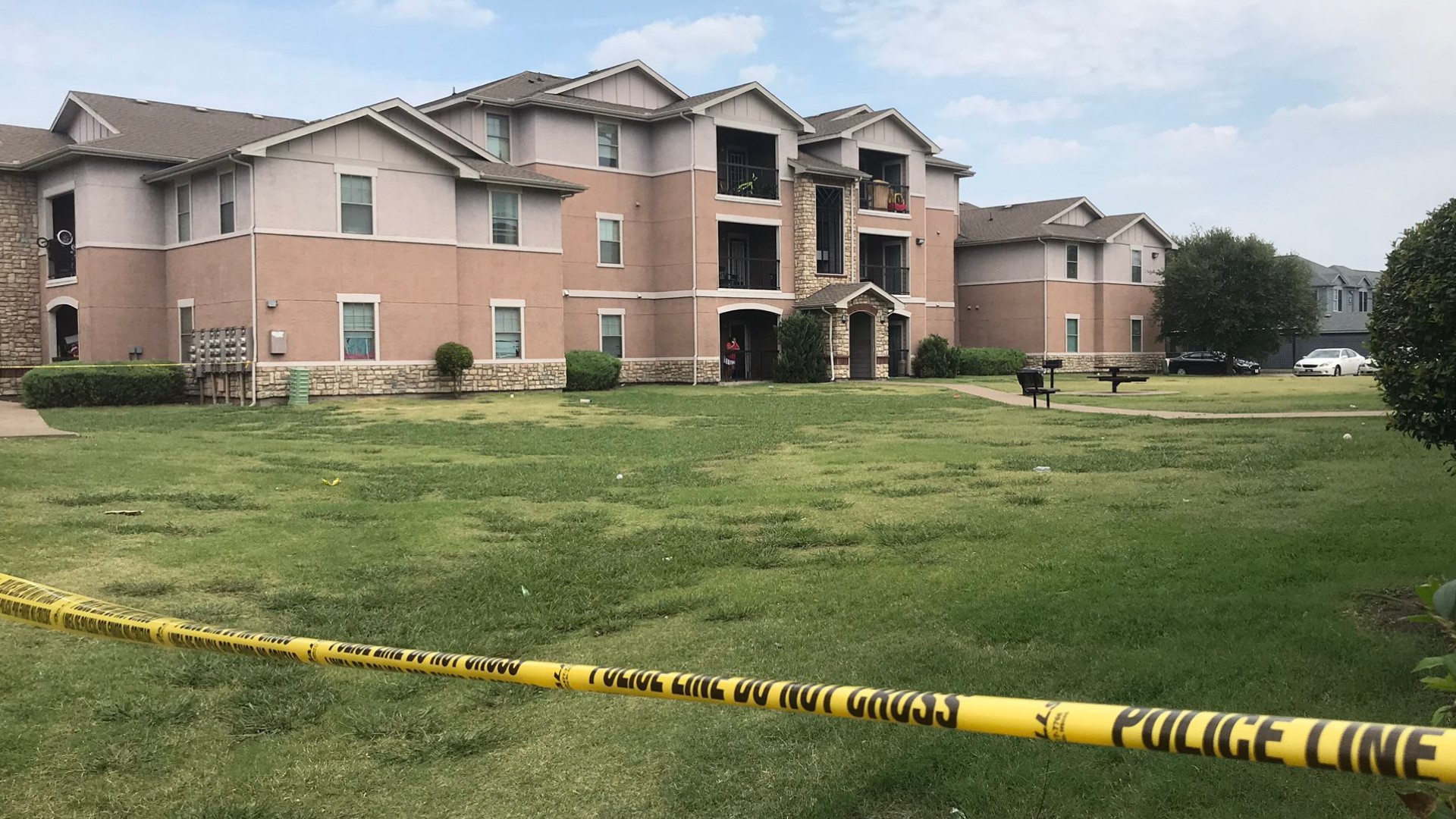 A man was taken into police custody after he called an alarm company to say he had killed his family at a Far East Dallas apartment complex.