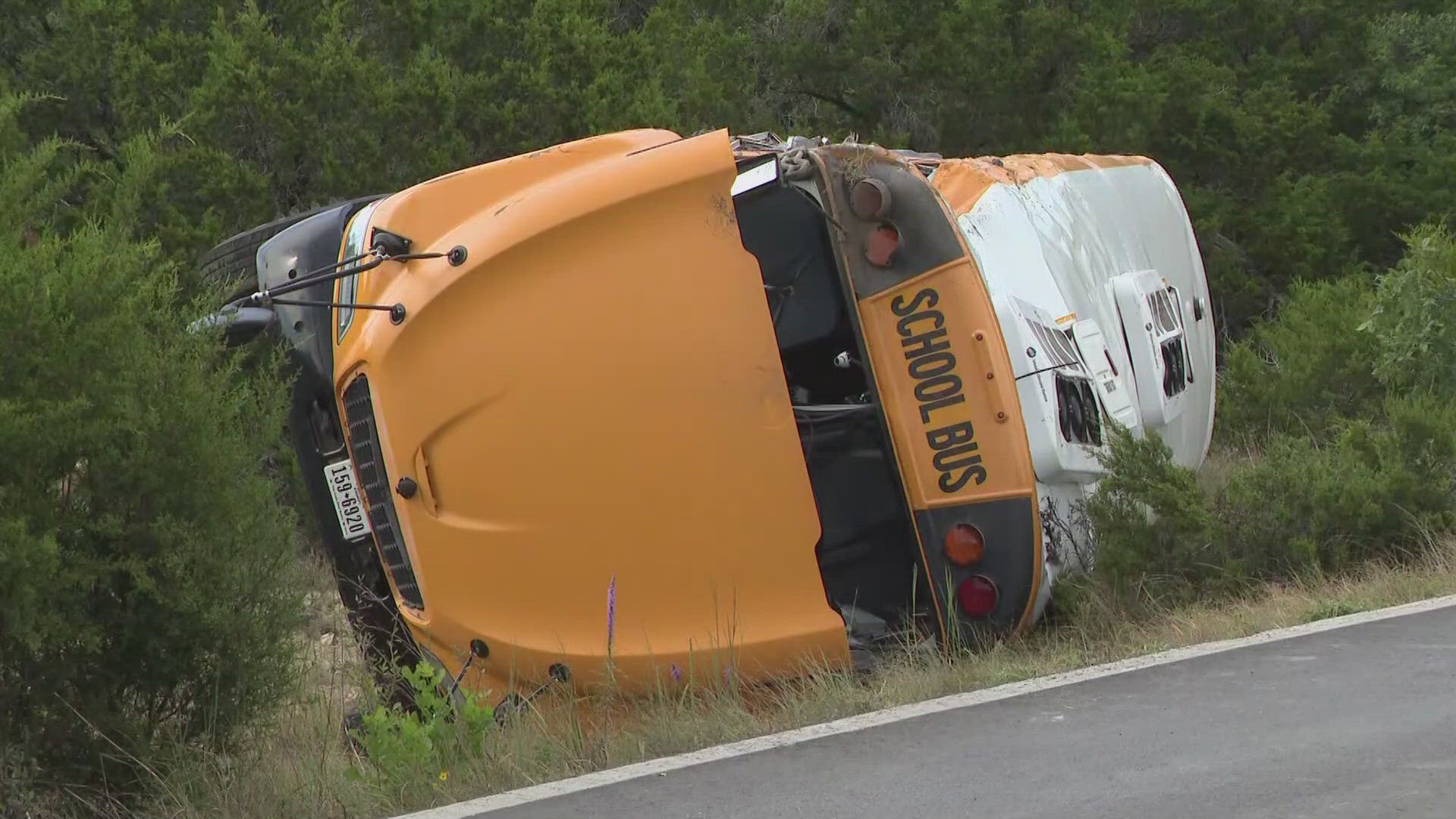 Officials say 42 children and one adult were on the bus when it crashed in Travis County.