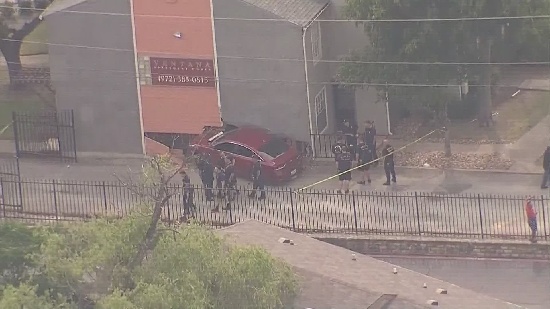 A car crashed into an empty apartment at the Ventana Apartments complex in Dallas.