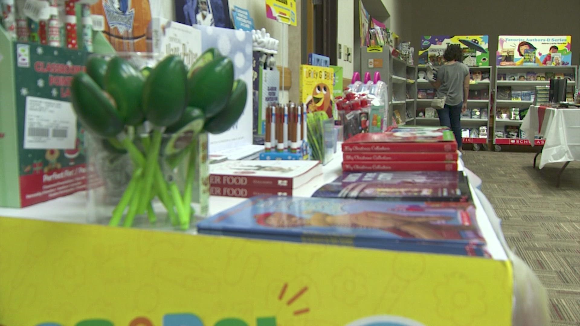 Kristine Leathers got help from volunteers putting together the first-ever parent book fair in the GCISD area.