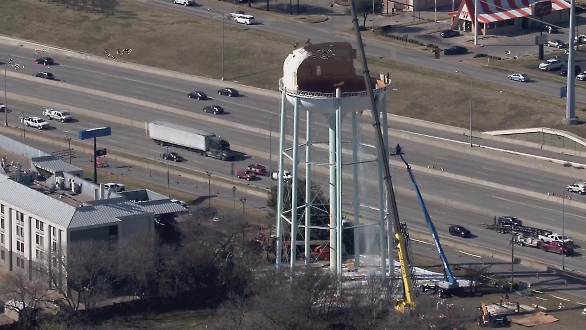 The iconic Lewisville water tower that has long served as a beacon for travelers coming into DFW is being dismantled.