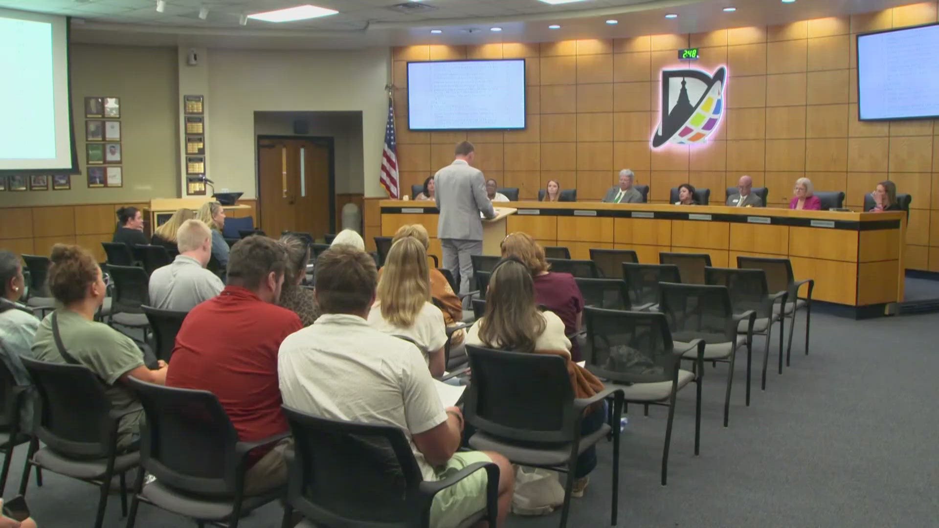 A student shared a petition calling on the district to remove a head football coach. 