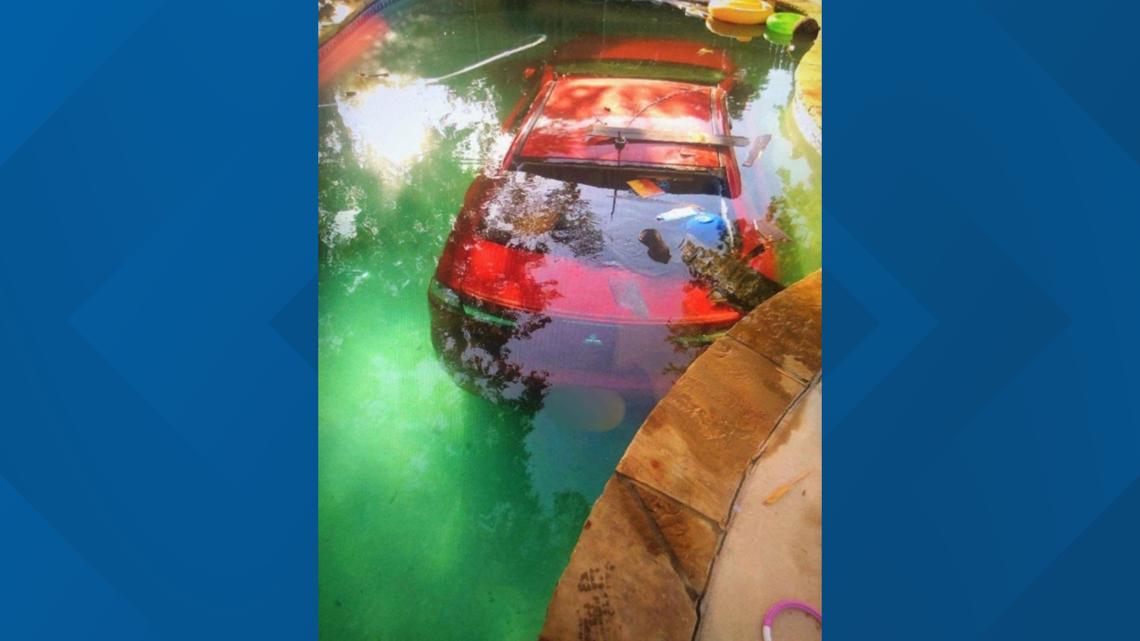 PHOTOS: Car crashes through fence, into pool at Arlington home | wfaa.com