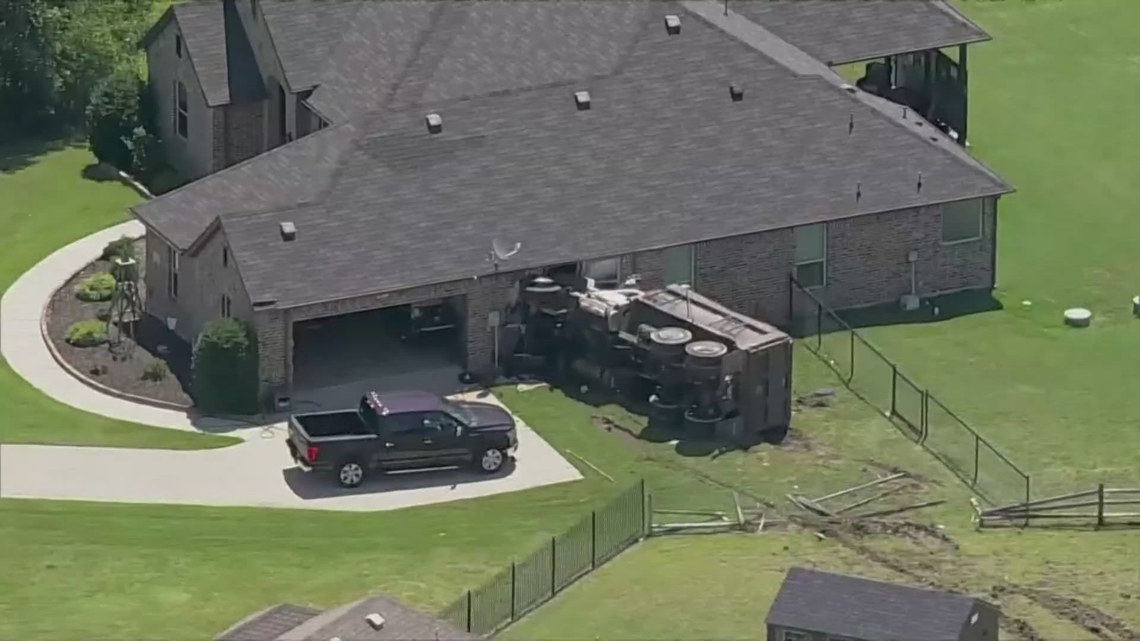 Driver injured after dump truck crashes into North Texas house ...