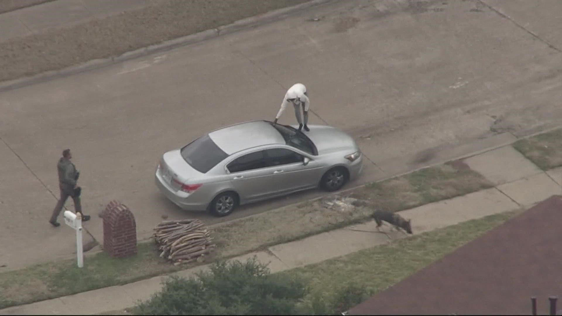 Authorities took a chase suspect into custody after a car and foot pursuit through Dallas County on Monday afternoon, officials say