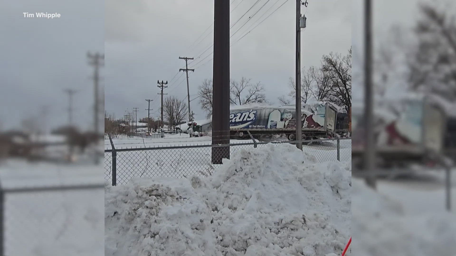 The driver escaped before the train hit the truck. 