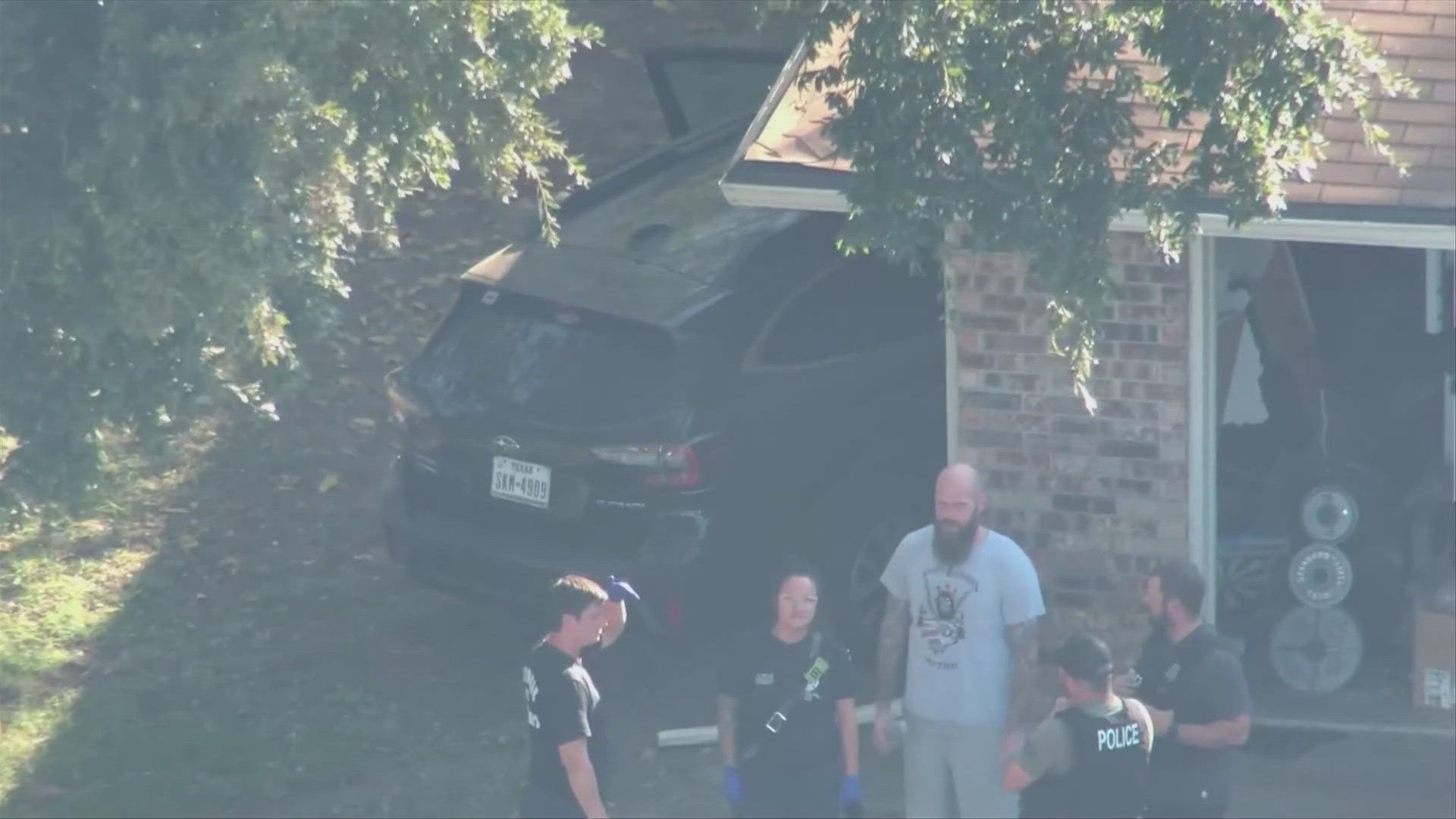 One man is in custody following a chase in Fort Worth that ended with the suspect crashing a stolen car into a home in Benbrook.