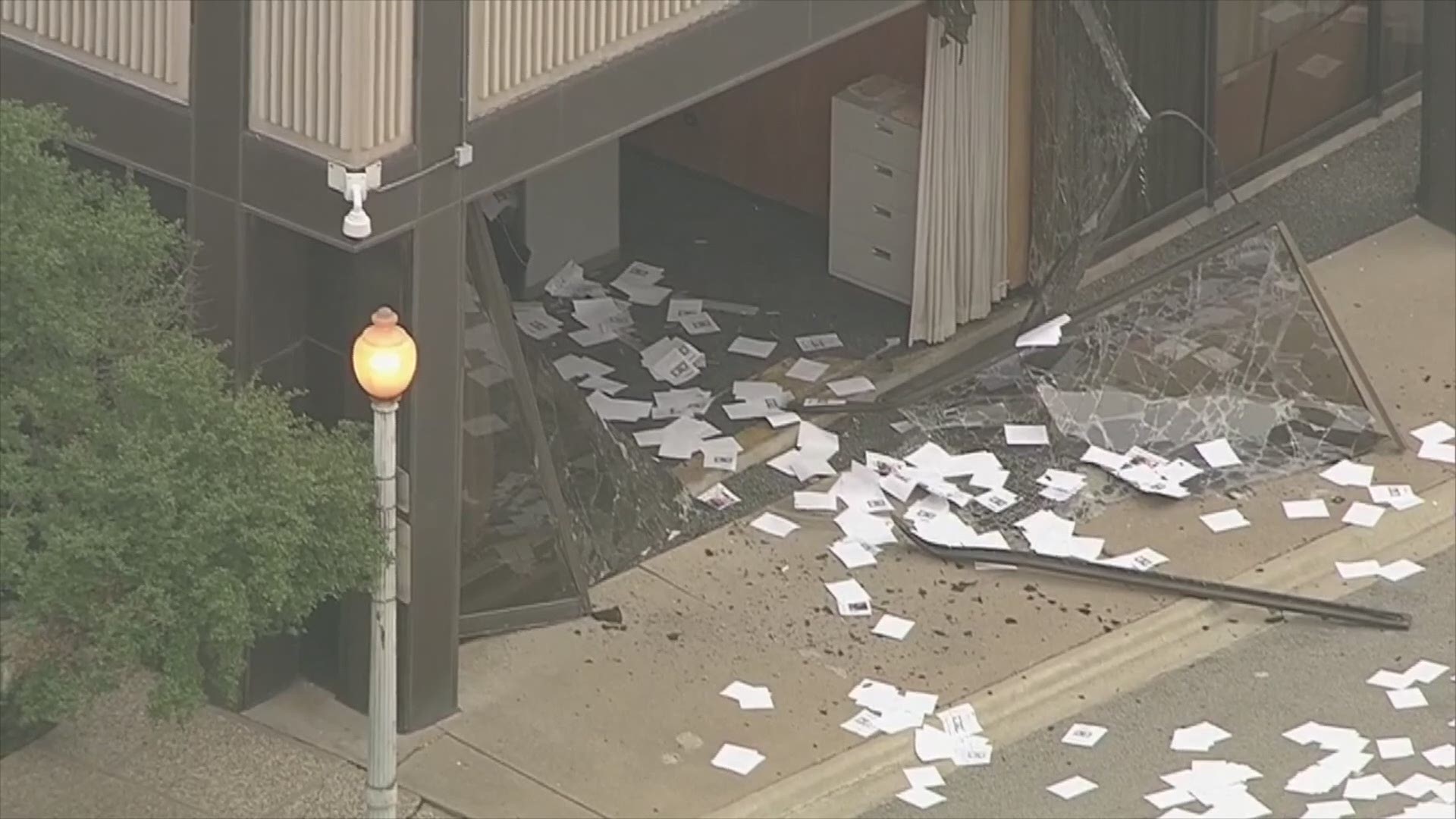 Aerial video of the scene after a pickup truck rammed repeatedly into the FOX 4 building in downtown Dallas. WFAA