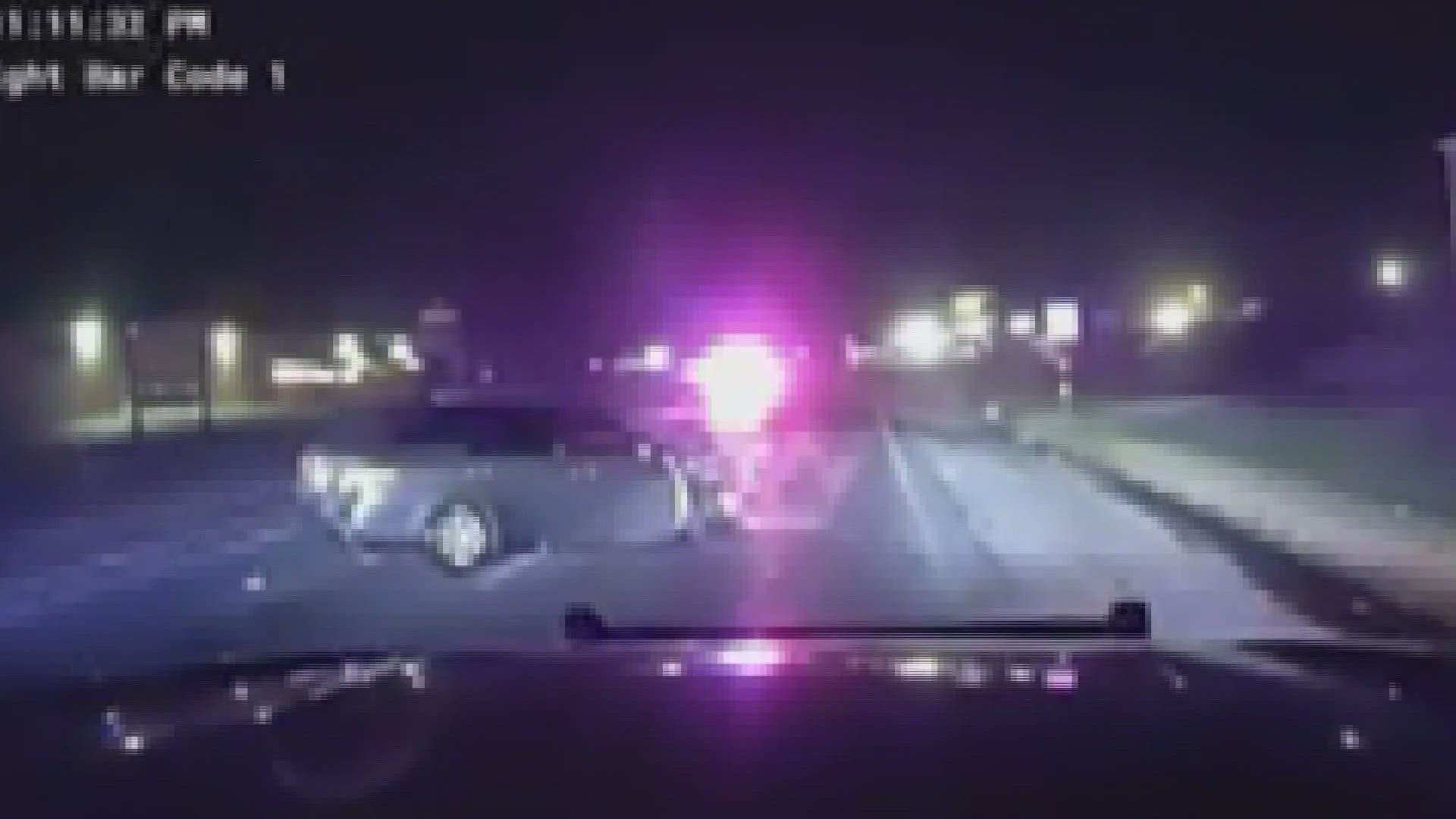 Dashcam video from Sansom Park Police shows a car being struck by a police vehicle that had its emergency lights on.