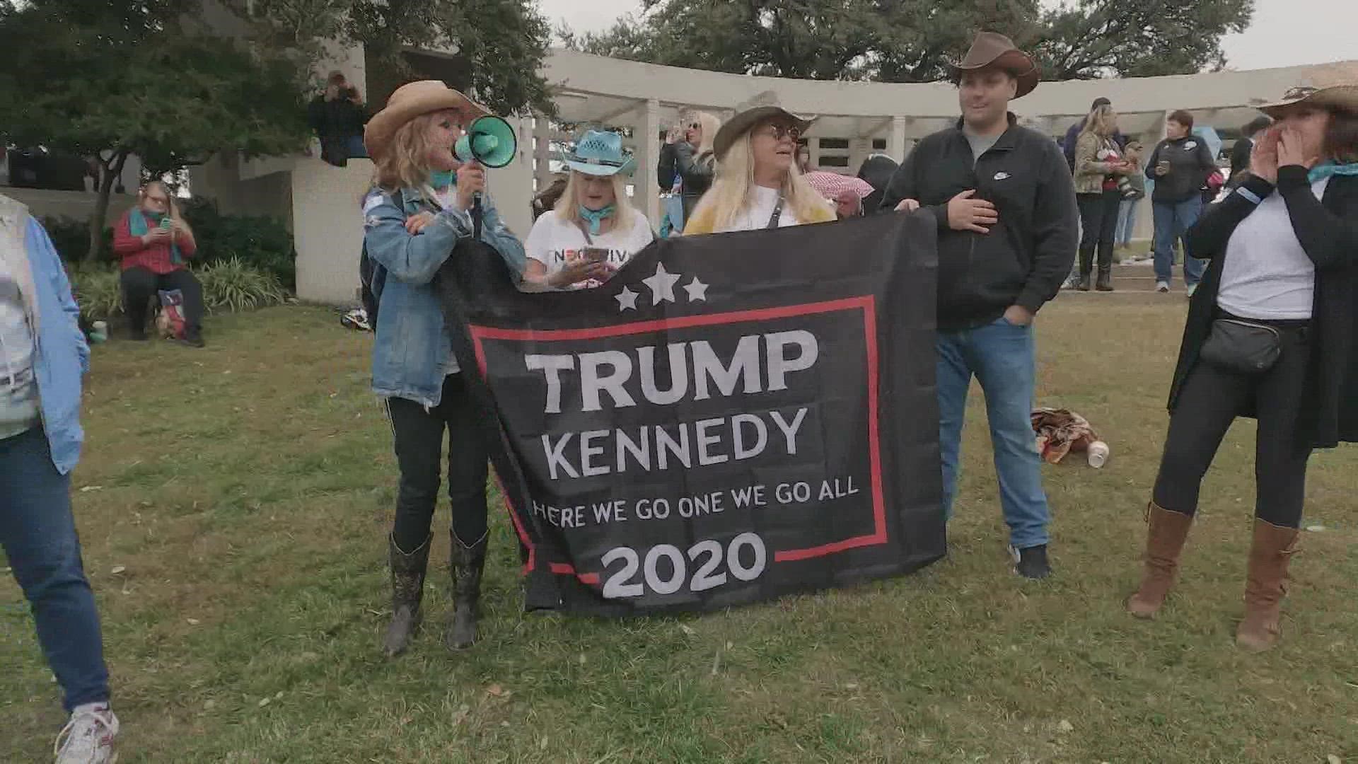In the last few months, QAnon followers have been flocking to Dallas. Last month, WFAA's Kevin Reece was at Dealey Plaza as hundreds of followers come together.