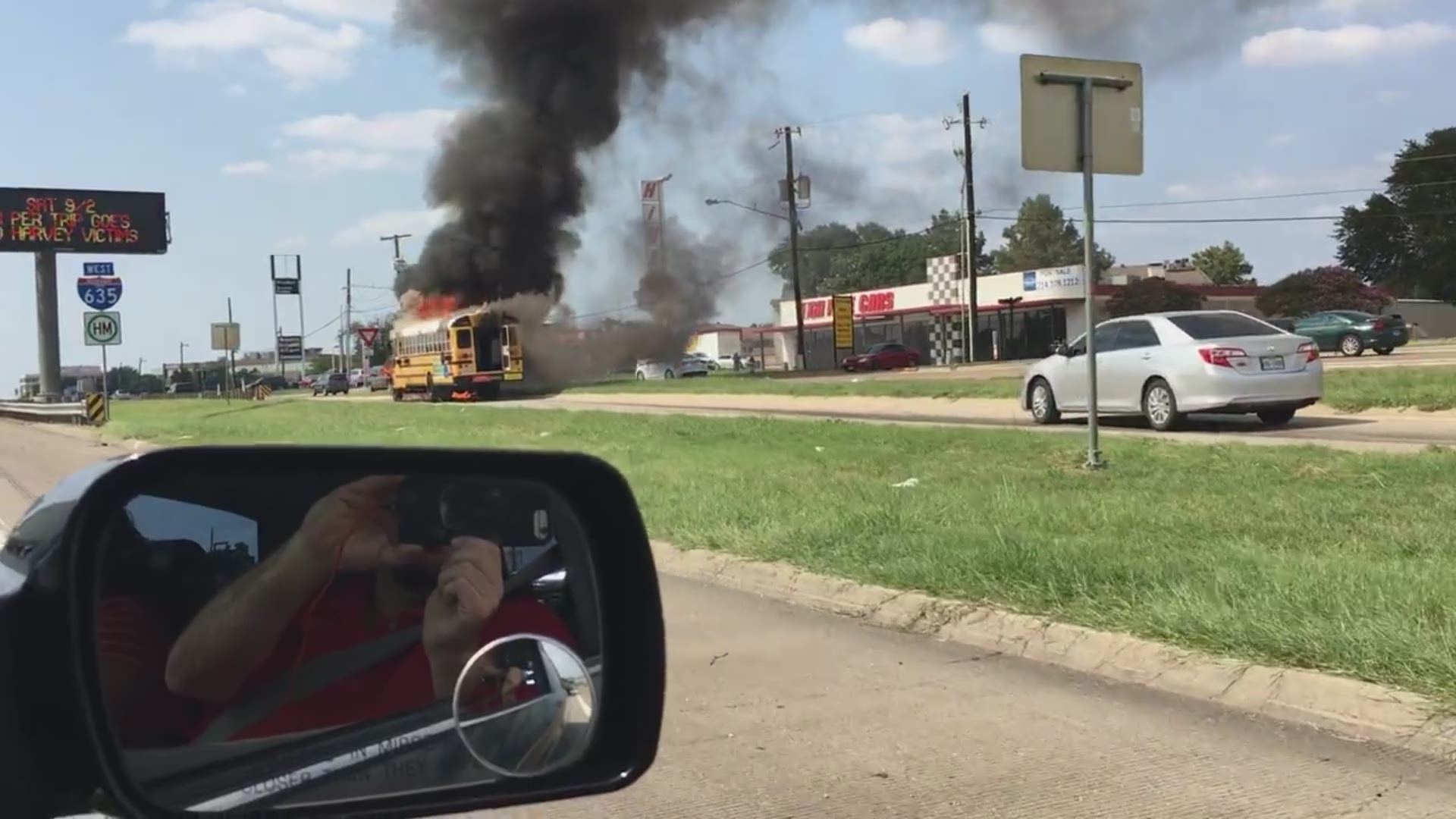 Dallas ISD school bus caught fire Friday afternoon near Interstate 635 and Forest Lane in northern Dallas. VIDEO COURTESY: John Seltzer