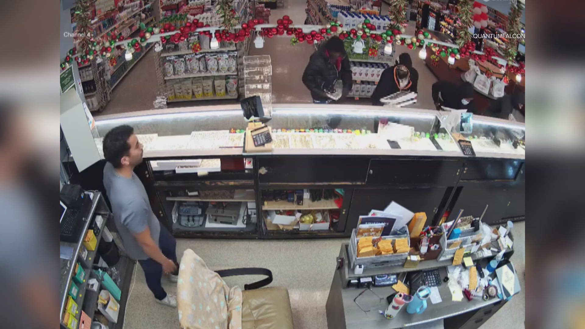 Surveillance footage shared by the owner of the store showed at least four suspects stealing from jewelry cases at the El Rancho Supermarket around 4:40 p.m.