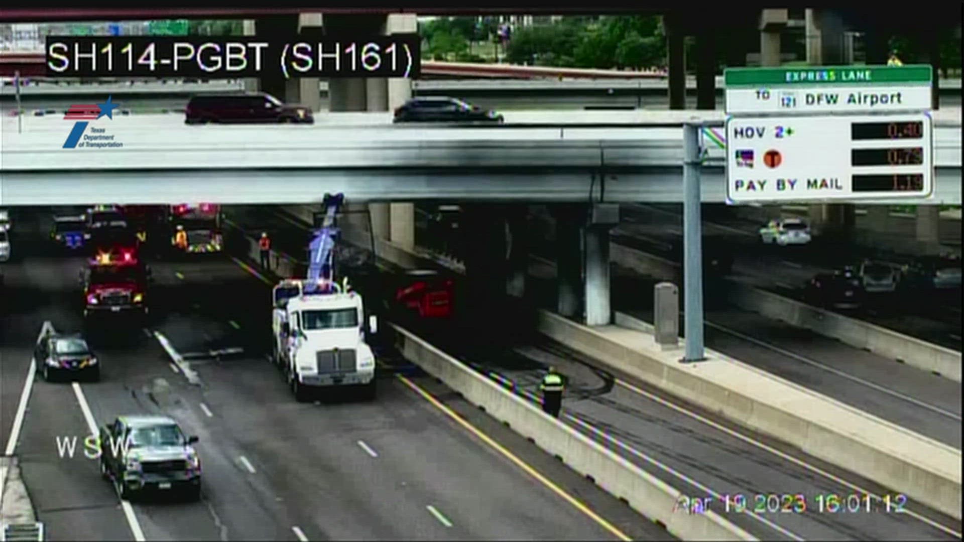 TXDOT camera footage showed the truck in flames letting off black smoke from beneath the bridge.