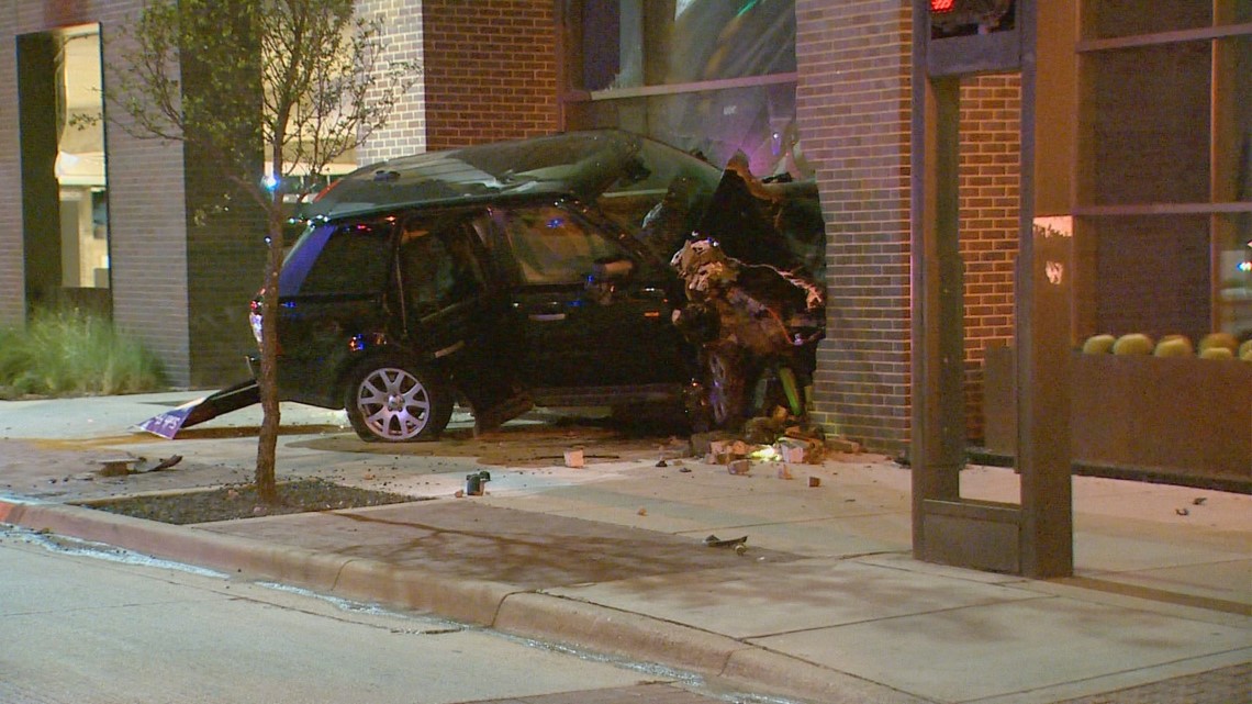 Driver rescued after SUV crashes into Dallas building | wfaa.com