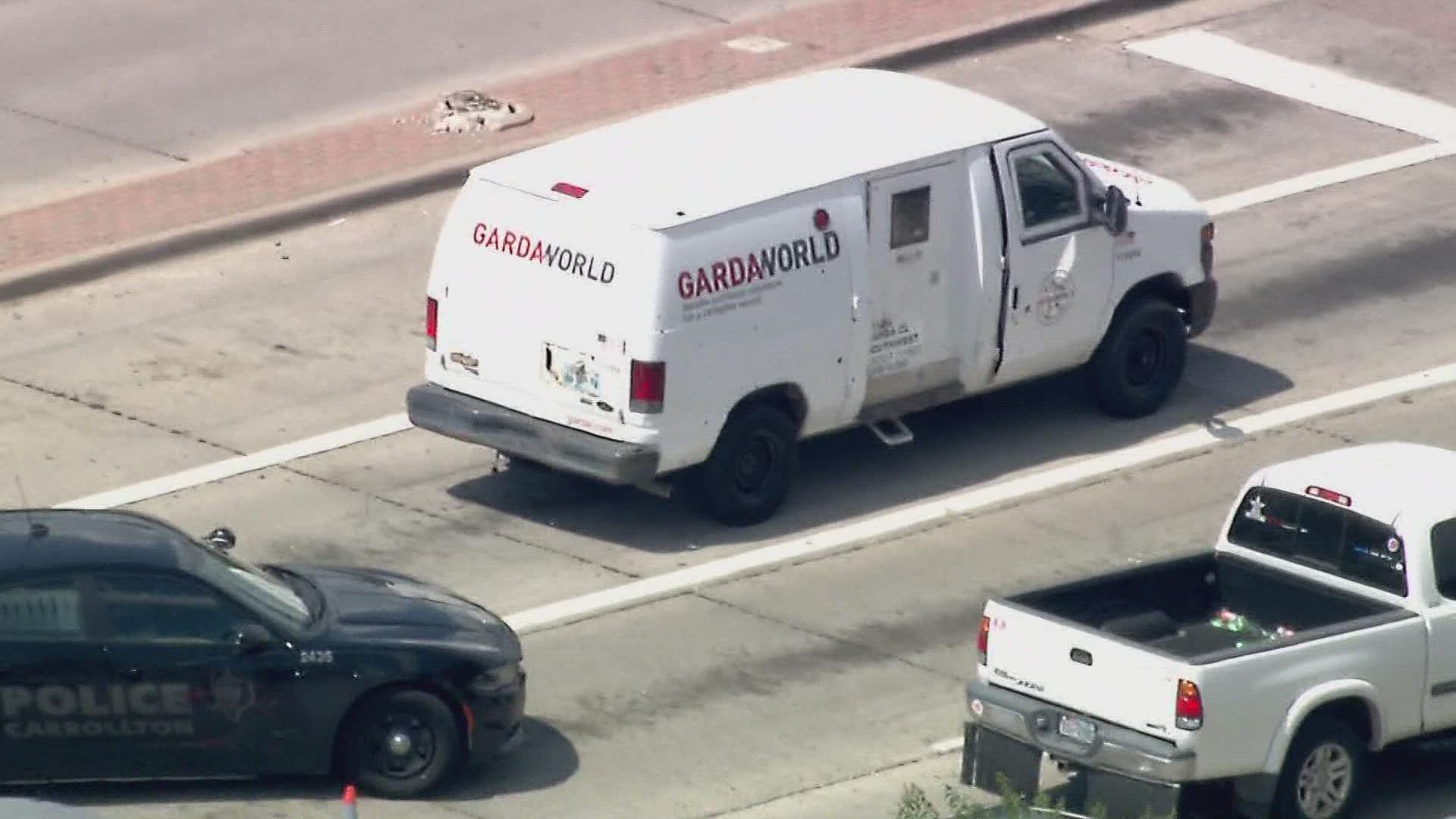Police say the armored truck employee was found suffering from a gunshot wound to the arm, but the employee's injuries are not life threatening.