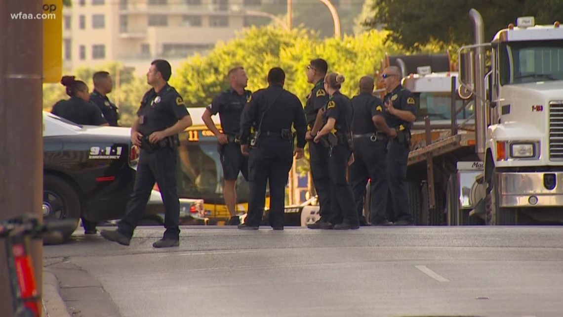 Bystander killed in shootout in downtown Dallas, police sources say