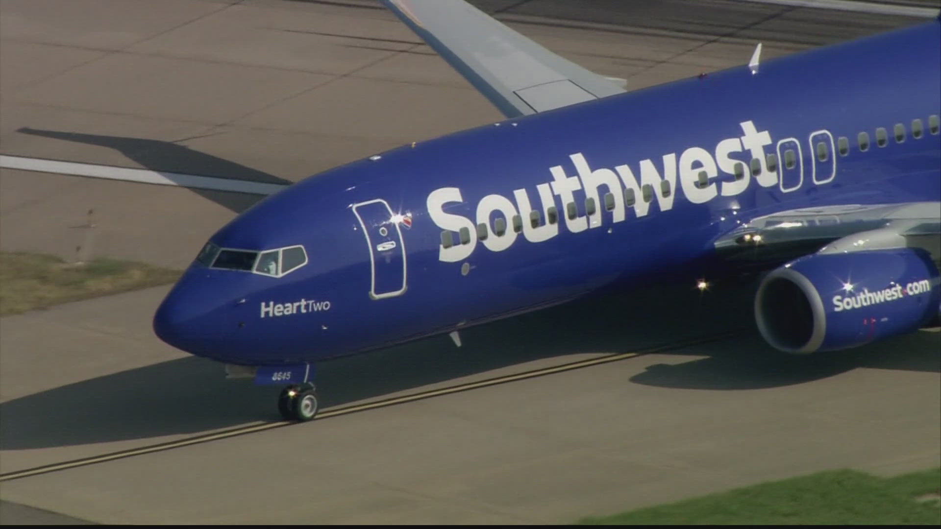 The Justice Department had accused the Dallas-based carrier of operating chronically delayed flights.