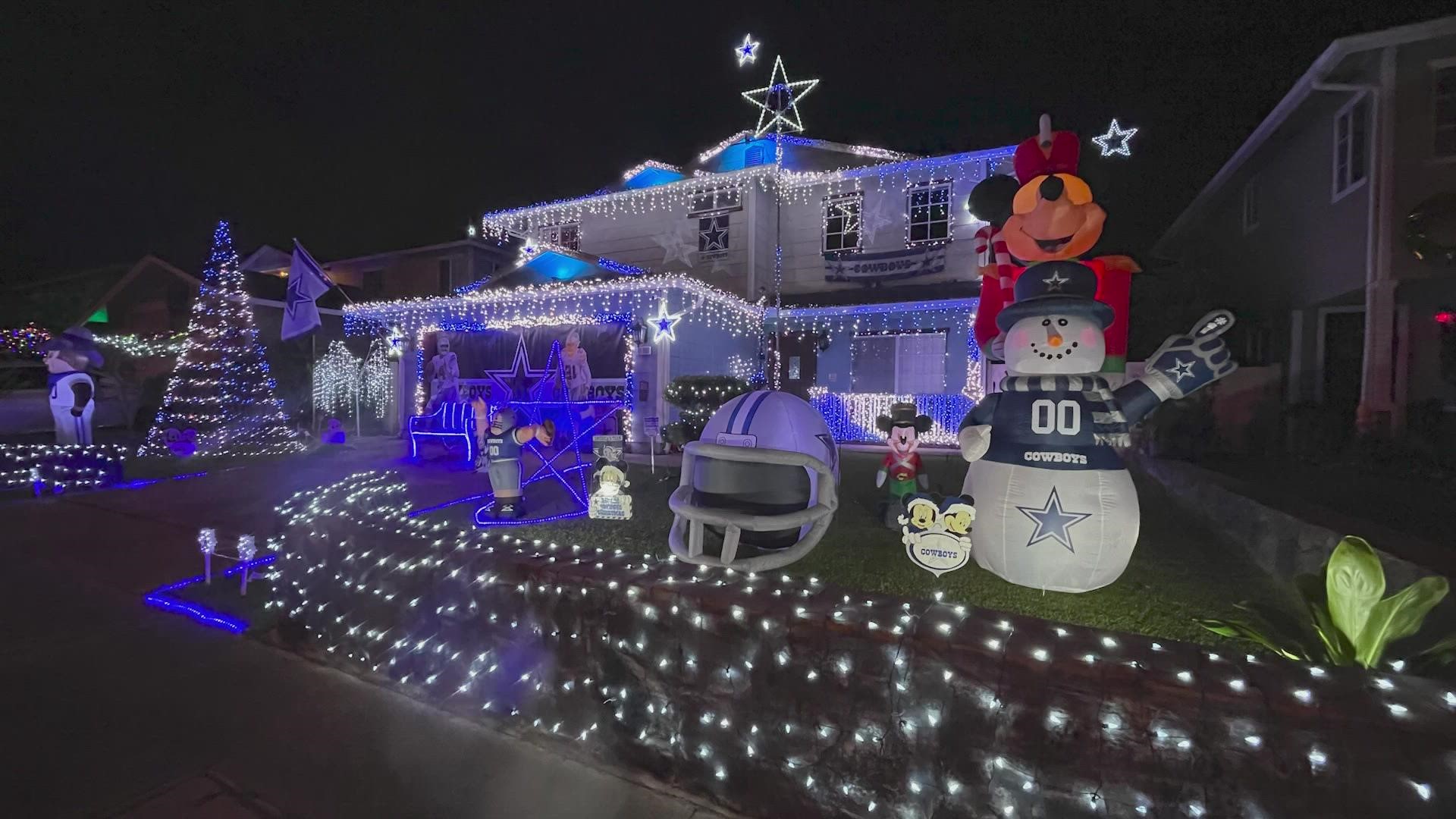 The Ahias started covering their home in Cowboys decorations for Christmas last year. Fans on Oahu Island have filled their street for pictures all December.