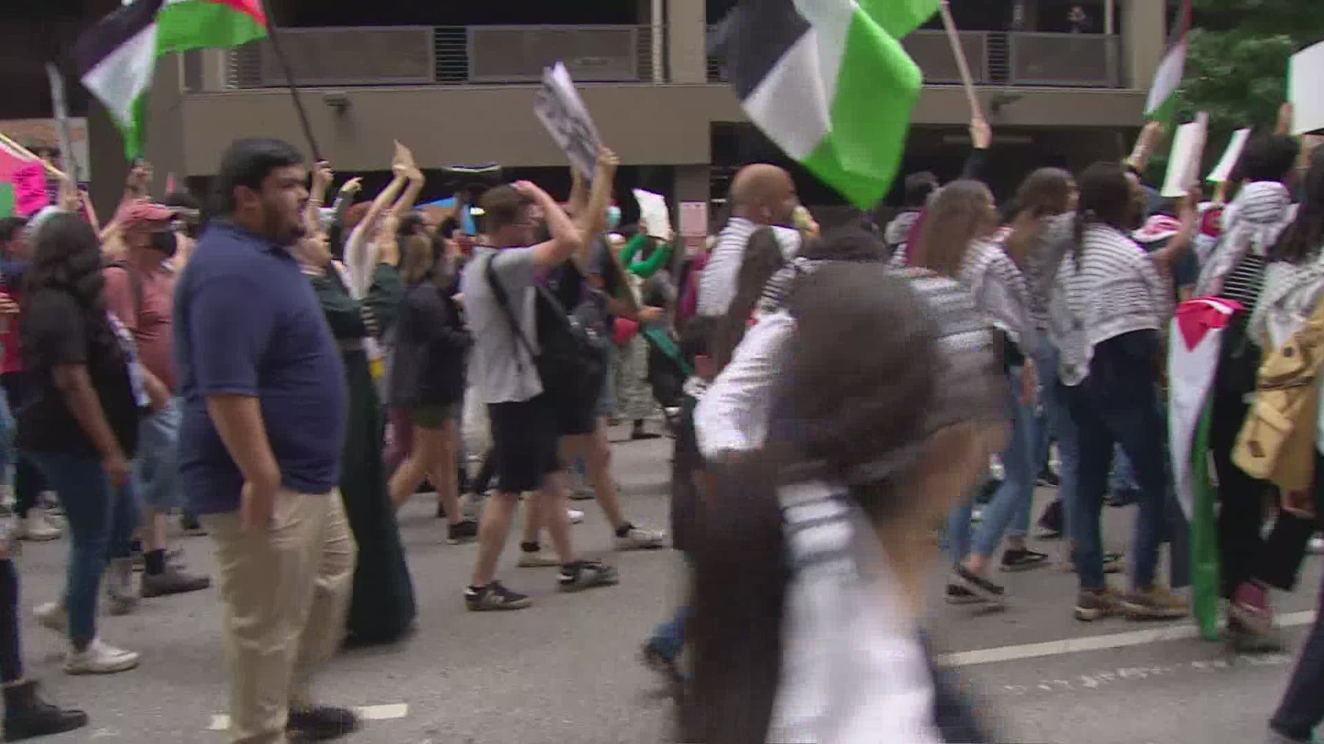 On Sunday afternoon, thousands of Pro-Palestinians took to the streets of downtown Dallas, chanting "Free Palestine" and holding up signs throughout the streets.