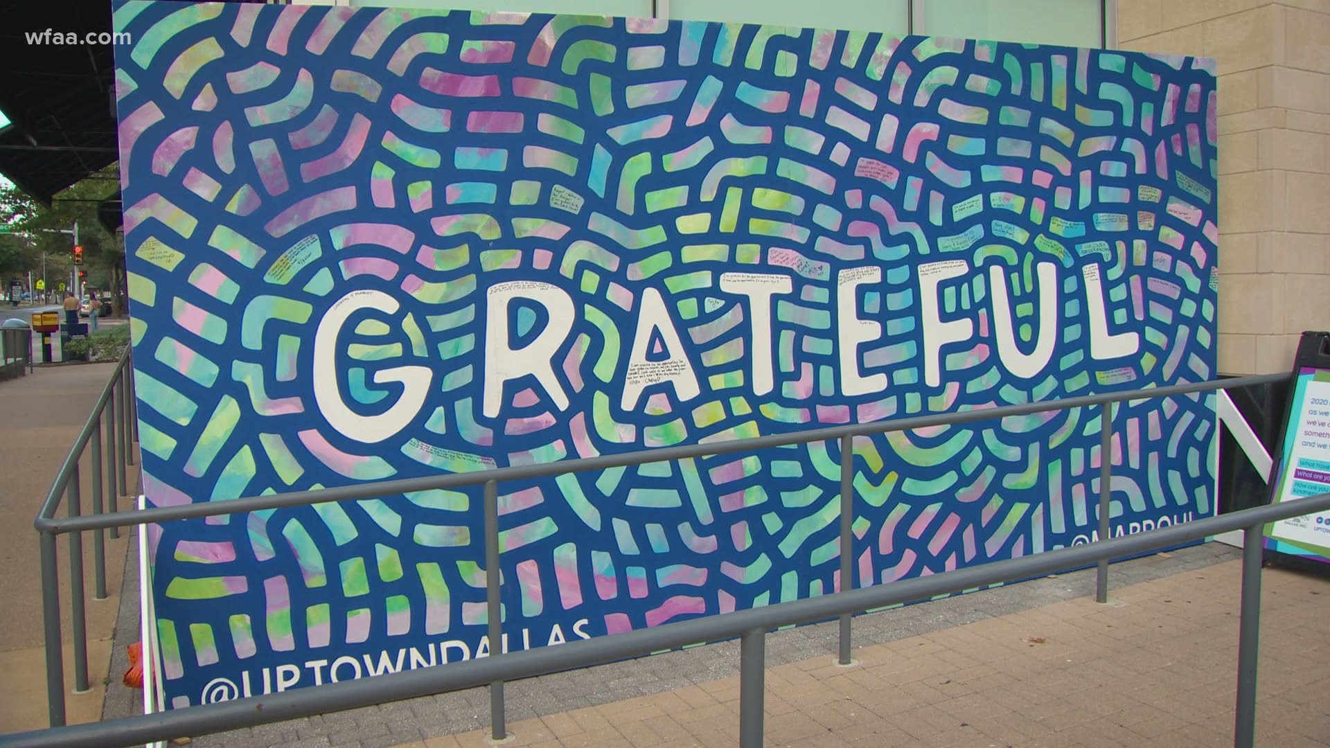 The "Grateful" wall is a public art project that invites people to grab a Sharpie and leave notes of positivity during challenging times.
