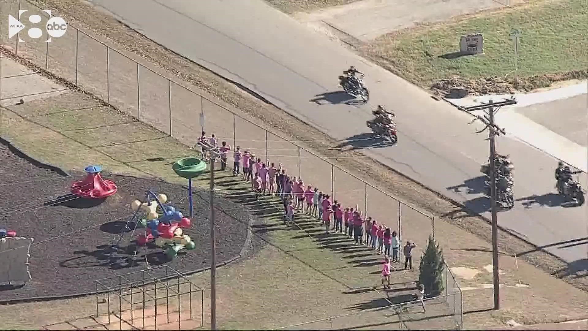 Athena Strand was found dead in Wise County on Friday. On Monday, a group of motorcyclists rode in her honor - and they passed Athena's school on the way.