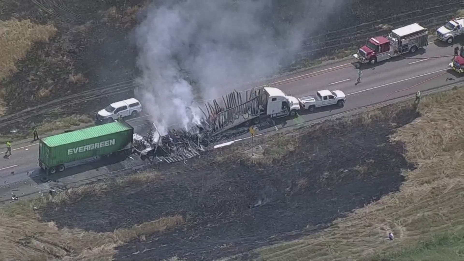 The crash caused both vehicles to set fire, which spread to the surrounding grass.