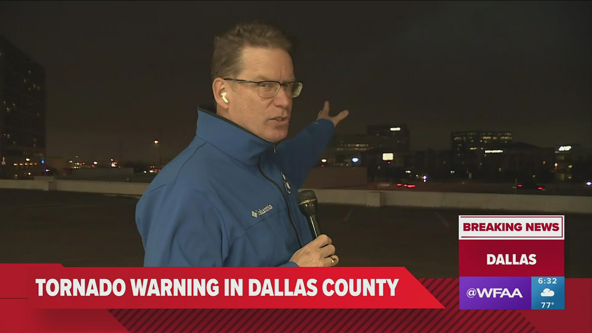 WFAA's Kevin Reece provides a live look in North Dallas after a tornado warning was issued.