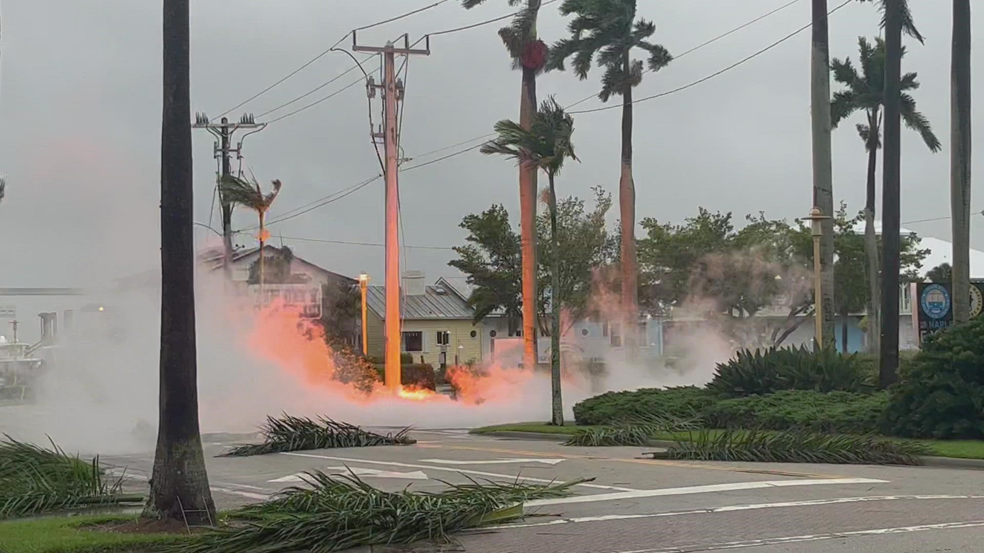 Power lines spark and threaten to cause fires in Naples, Florida.