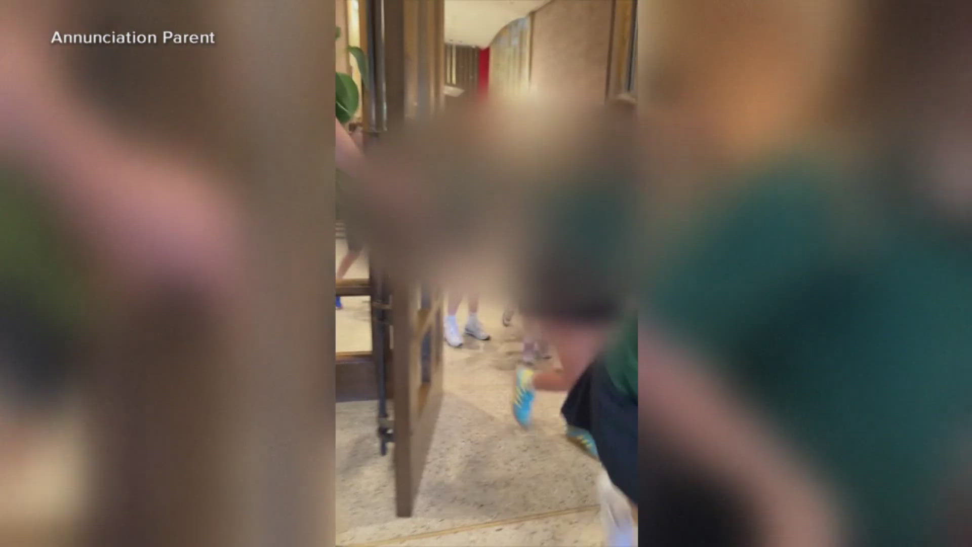 New video from inside a Minnesota church shows students running for cover as a gunman killed two children and injured a dozen more.