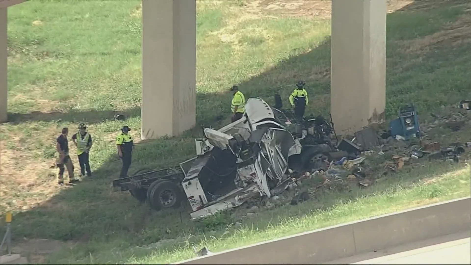 Footage of the scene shows at least one vehicle had crashed to the ground beneath the roadway.
