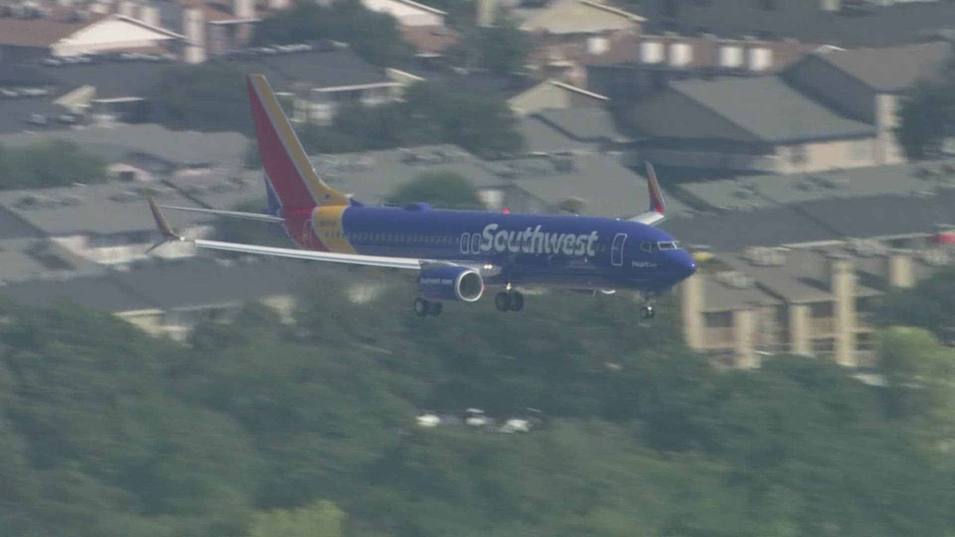 Dallas-based Southwest Airlines is shr inking its board from 15 members to 13 as part of an agreement with activist investor Elliott Investment Management.