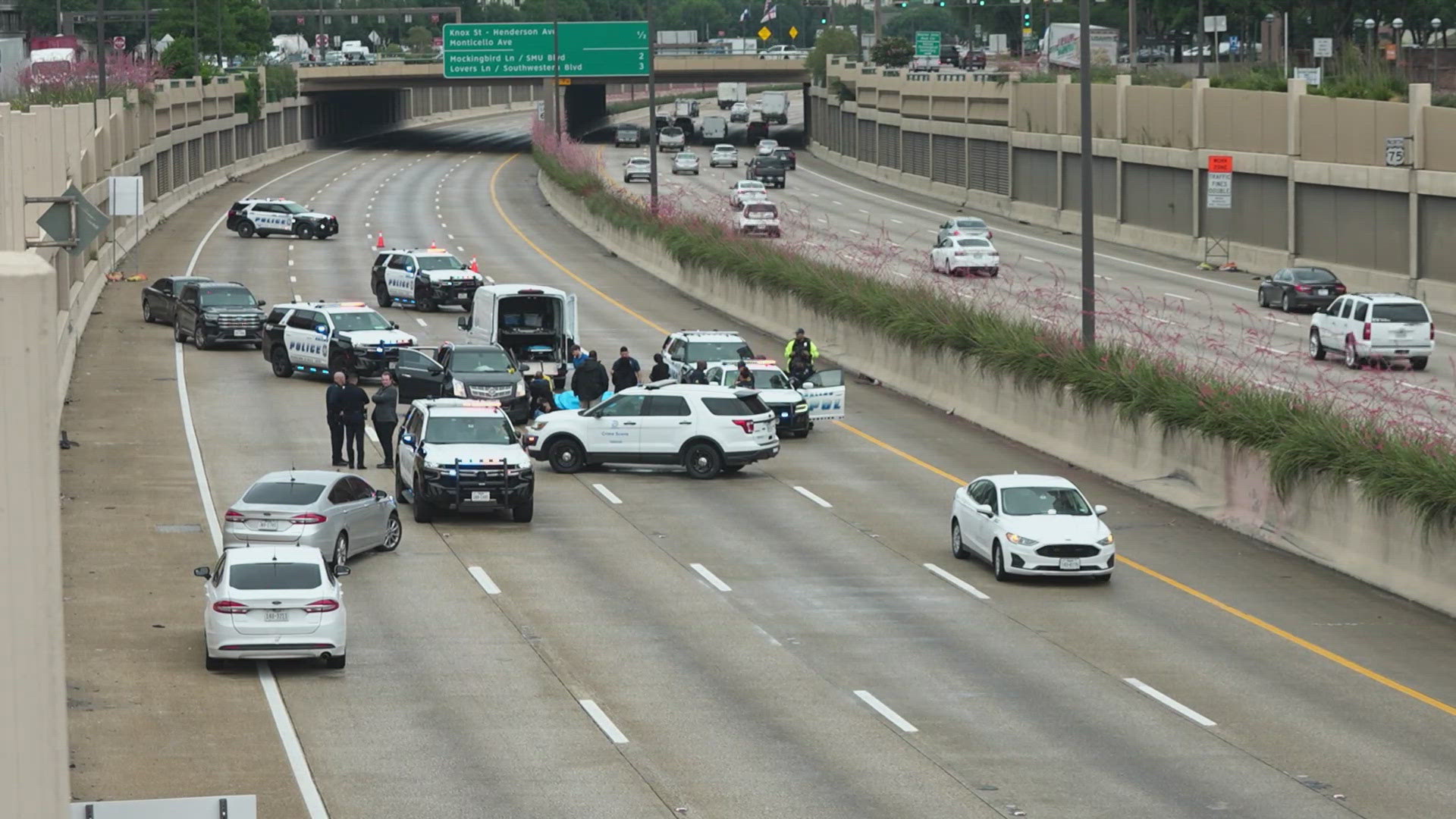 Police diverted traffic off the highway at the Haskell Avenue-Blackburn Street/Lemmon Avenue exit.
