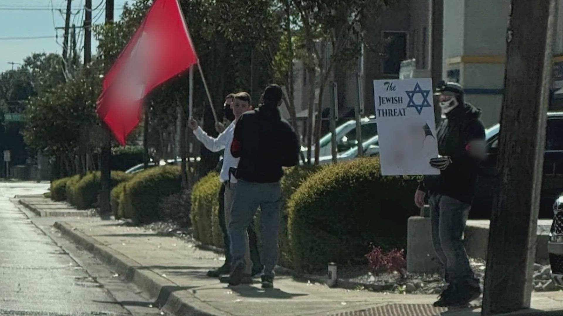 Five people waved a Nazi flag across the street from the Dallas synagogue Saturday, a spokesperson says.