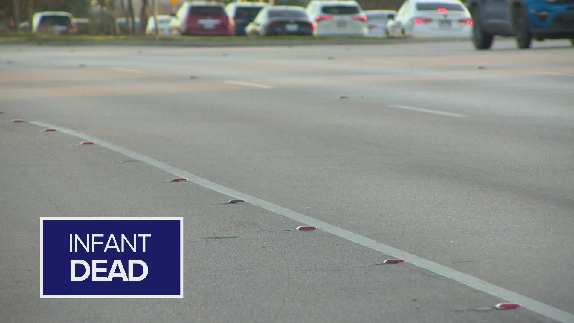 An investigation is underway after an infant fell out of a moving vehicle and was then hit by another car in Irving Sunday, police said.