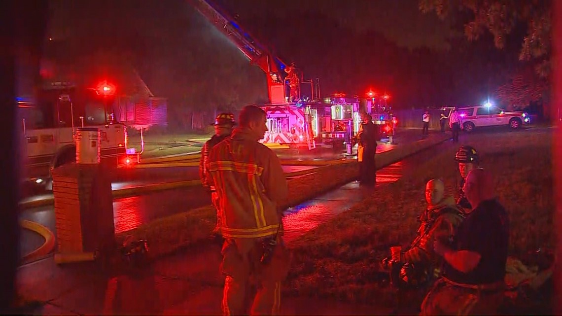 Firefighters battle house fire in Keller as storms roll through
