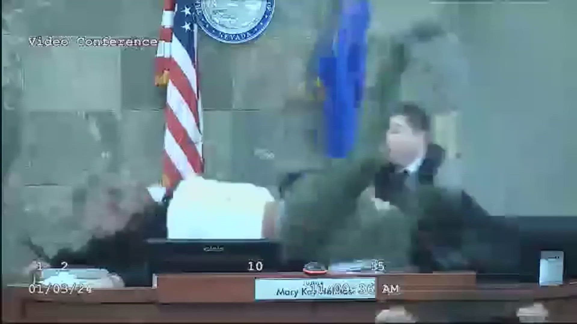 Video shows the man jumping over the bench in court to attack the judge.