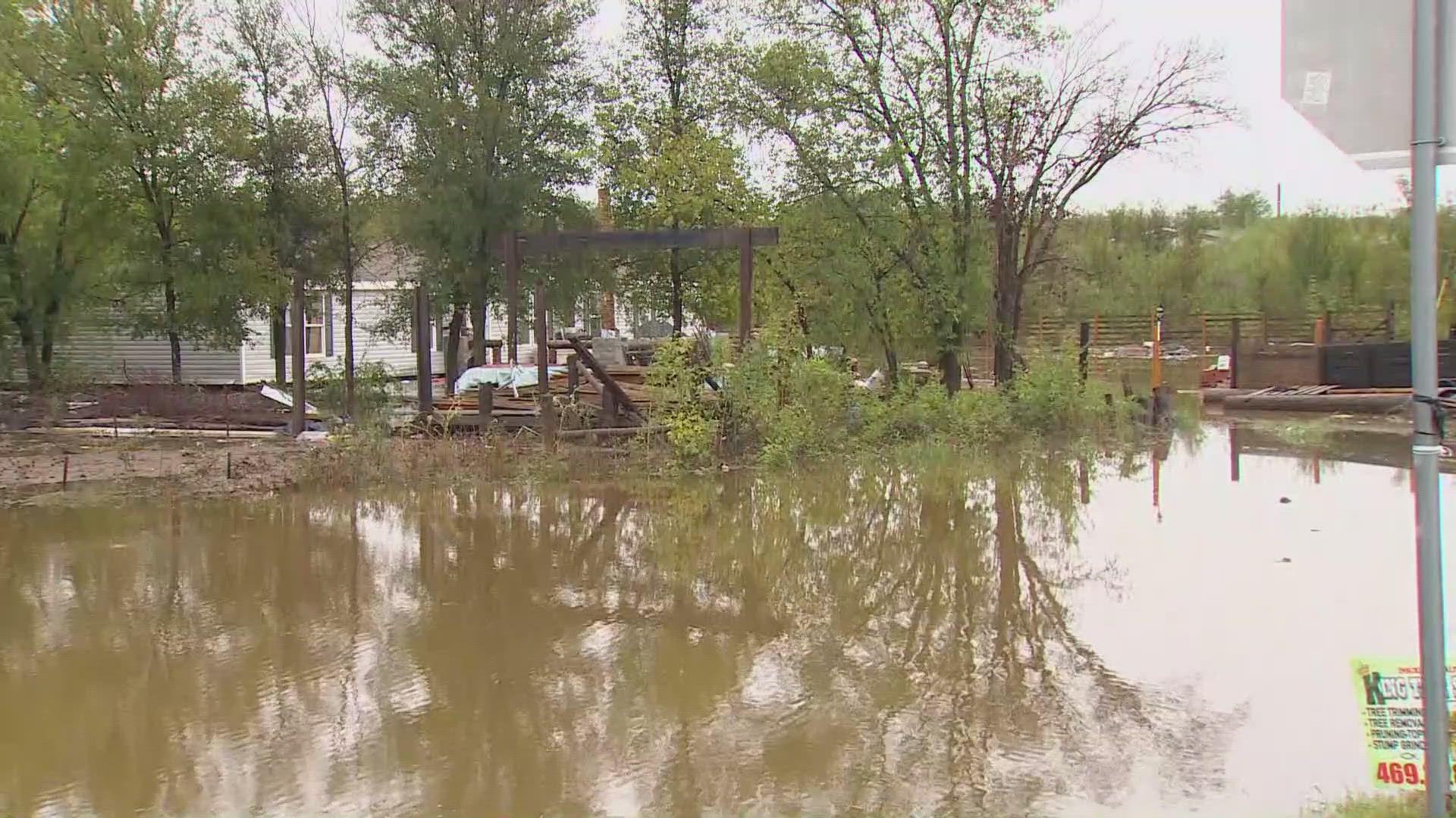 The emergency management coordinator for Kaufman County said authorities believe the two victims drove into high water near the intersection of FM 148 and FM 1390.