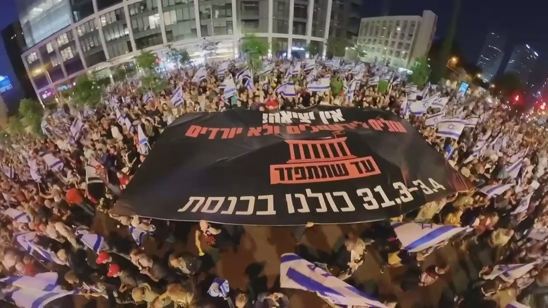 Video shows protestor chanting in Hebrew: "We will not give up until things get better."