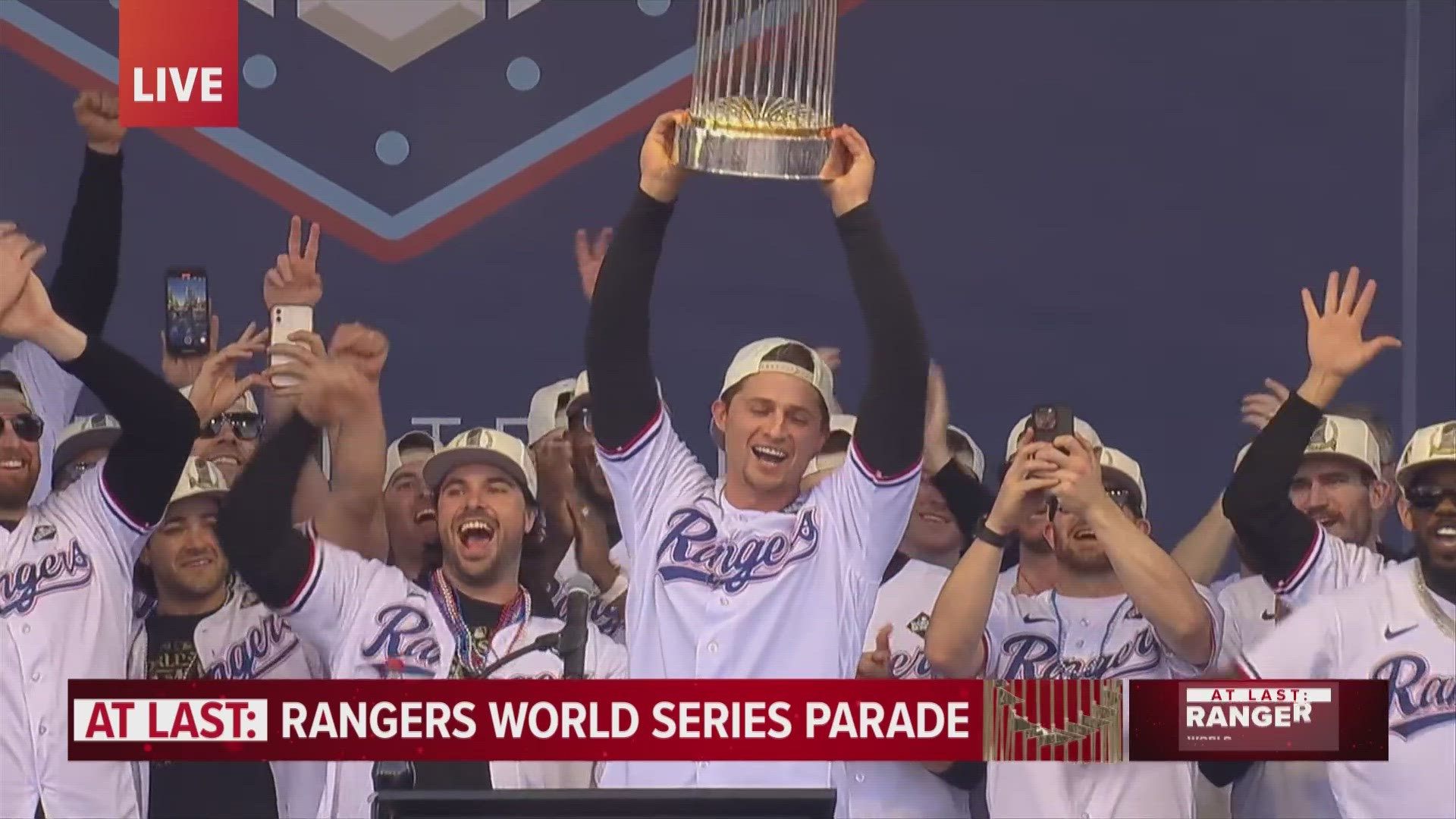 The Texas Rangers held up the World Series trophy at the team's championship parade in Arlington, Texas.