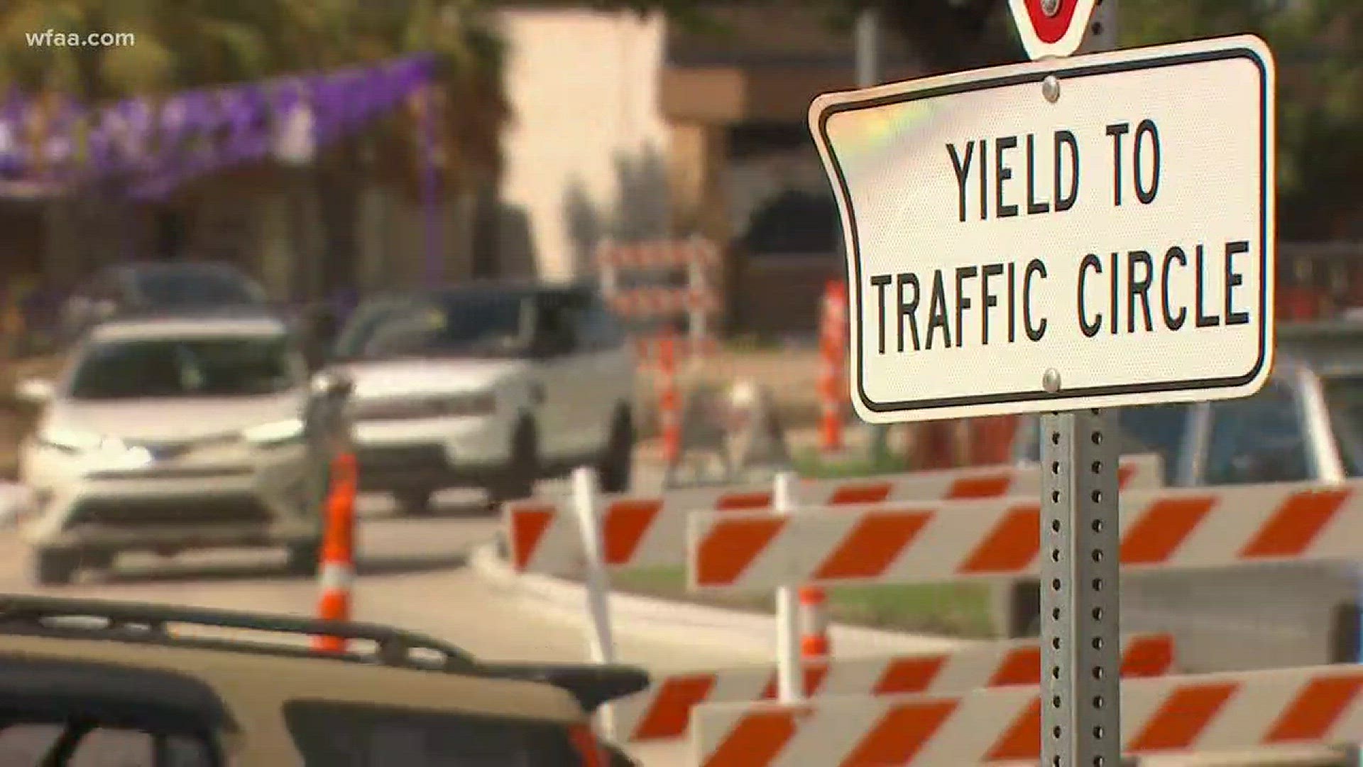 The ongoing project continues to cause parking headaches along the busy Fort Worth traffic circle.