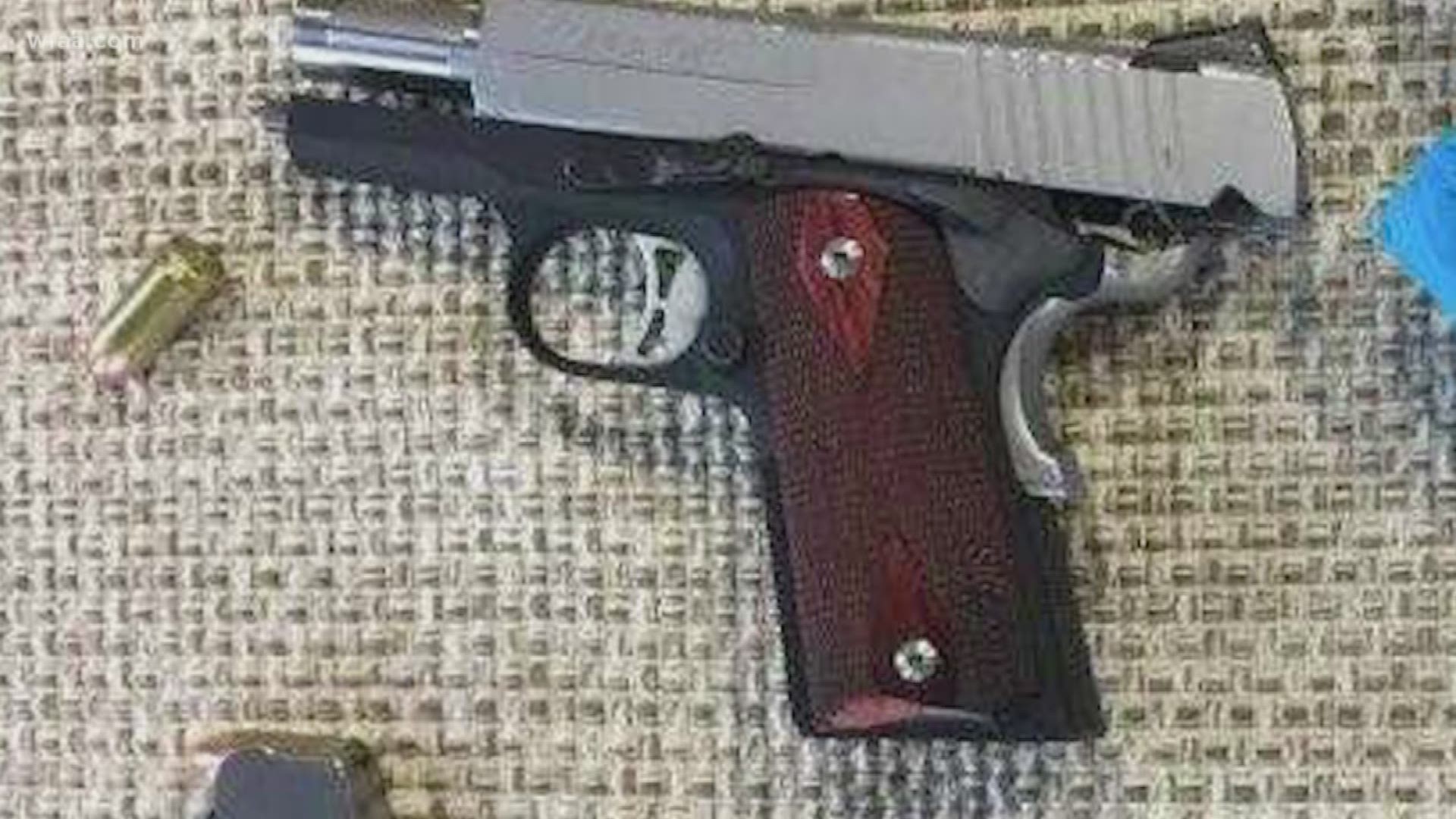 Loaded gun found steps away from school