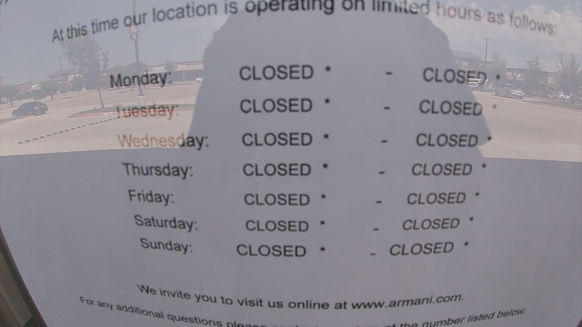 Though malls are allowed to open with 25% occupancy, many stores remain closed.