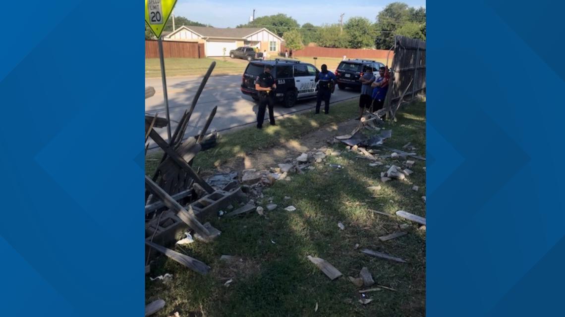 PHOTOS: Car crashes through fence, into pool at Arlington home | wfaa.com