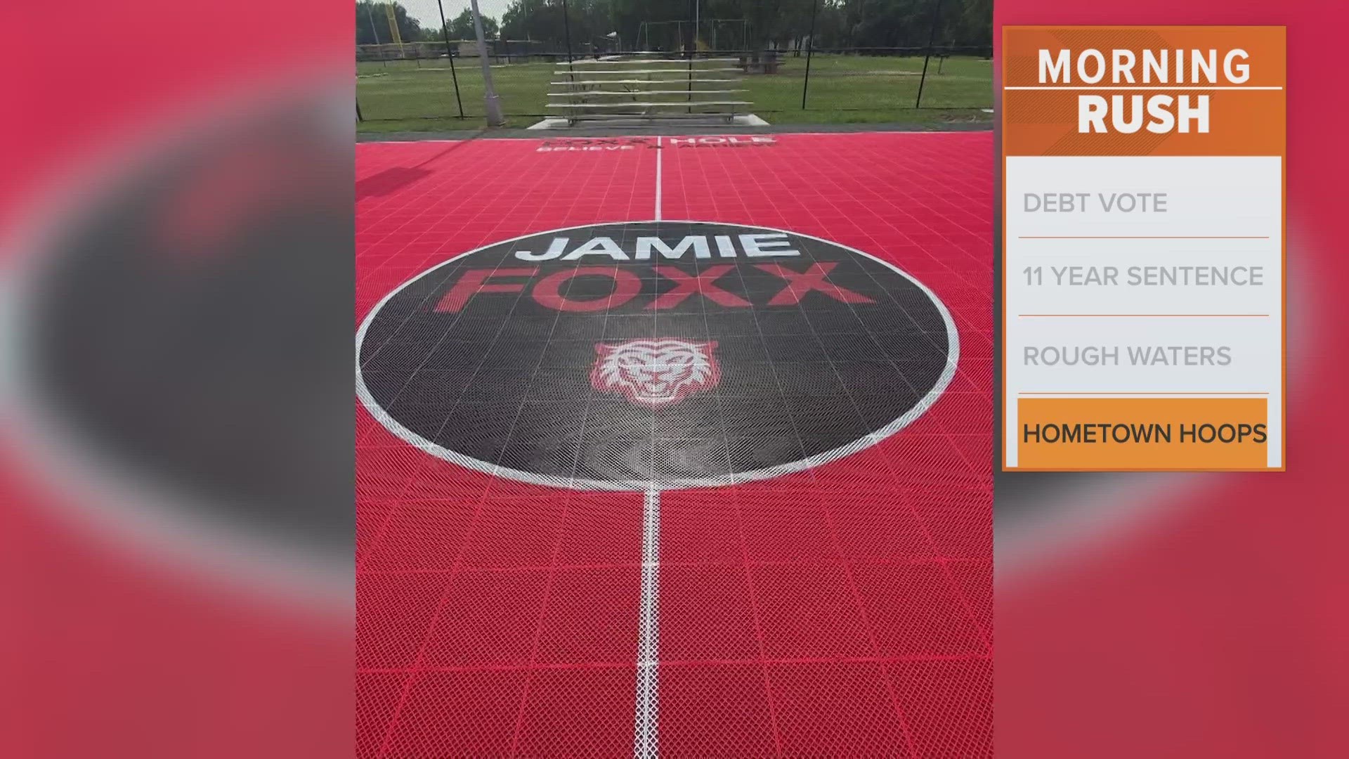 The red-colored court has Jamie Foxx written at center court and "Foxx Hole: Believe & Achieve" above that.